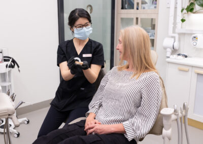Restoring Smiles with Custom Ceramic Crowns